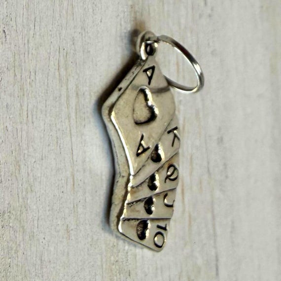 Playing card western hat charm closeup
