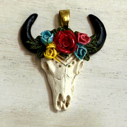 Close-up of floral bull skull western hat charm style 1 with colorful roses and black horns