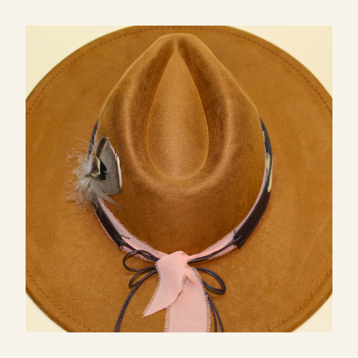 Original top-down khaki hat detail with blush frayed ribbon, leather bow and short natural feathers