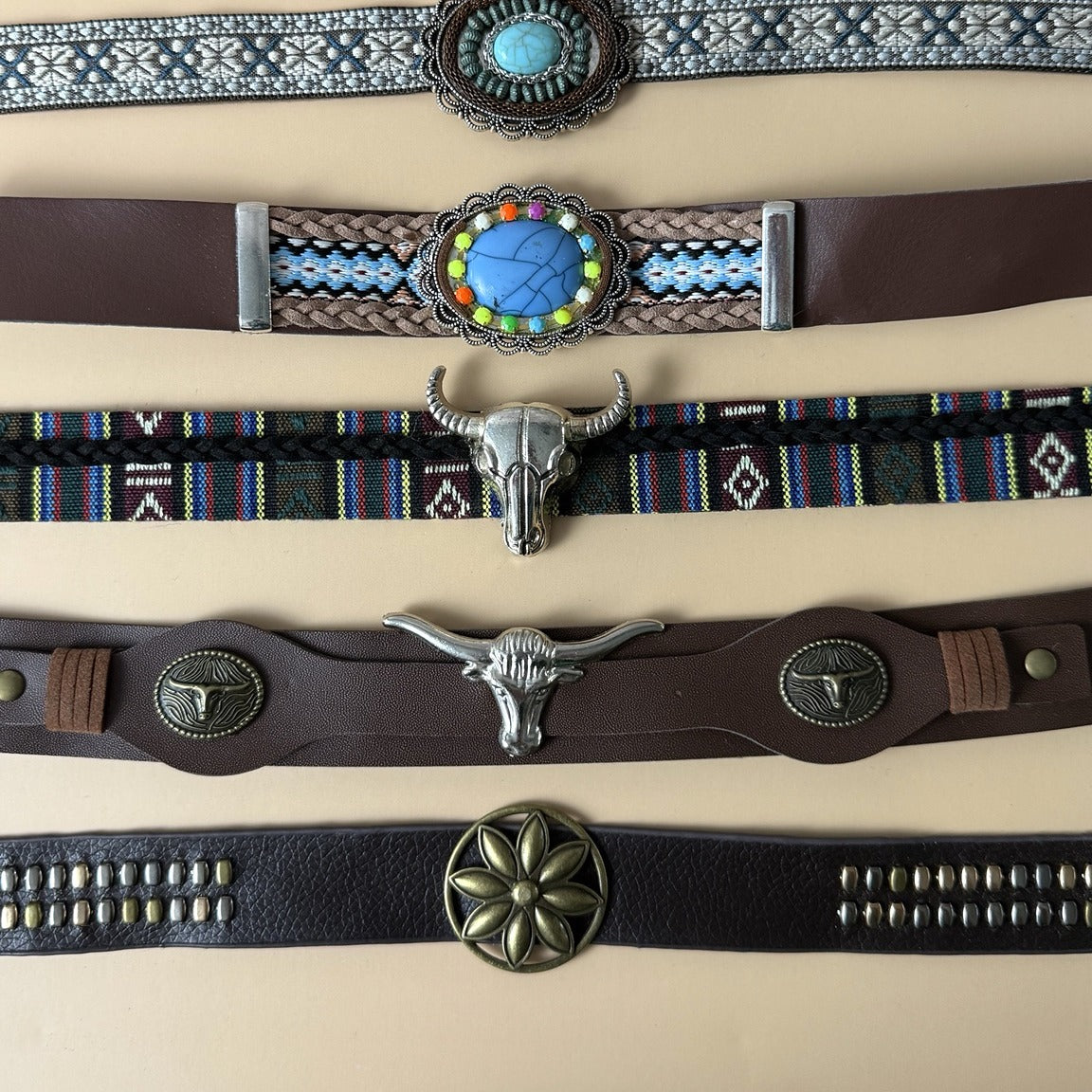 Close-up of western concho and bull skull hat bands
