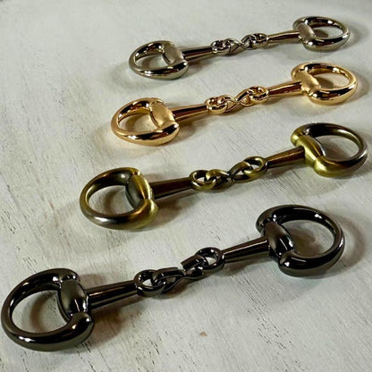 Western horse bit connector styled on a hat