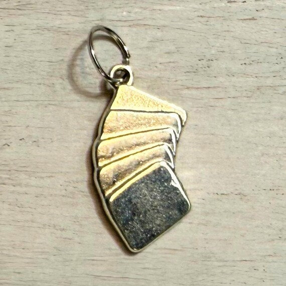Playing card western hat charm detail