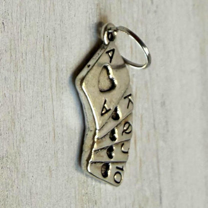 Playing card western hat charm closeup