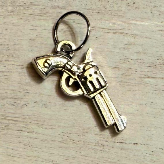 Silver tone revolver western hat charm