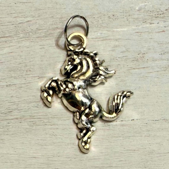 Running horse western hat charm in gold and silver finishes