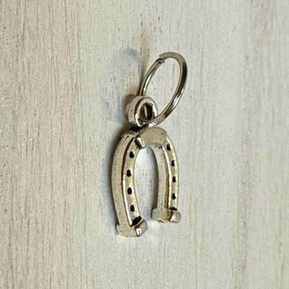 Silver western charm closeup